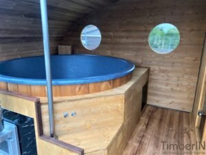 Ovale buitensauna met geintegreerd bubbelbad 11