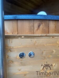 Ovale buitensauna met geintegreerd bubbelbad 13
