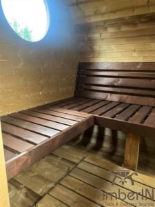 Ovale buitensauna met geintegreerd bubbelbad 15