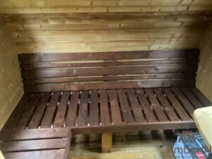 Ovale buitensauna met geintegreerd bubbelbad 16