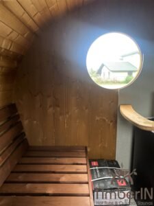 Ovale buitensauna met geintegreerd bubbelbad 18