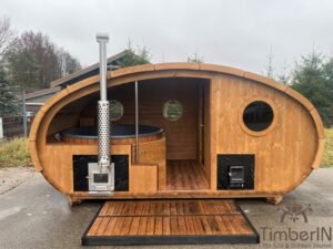 Ovale buitensauna met geintegreerd bubbelbad 21