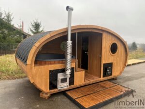 Ovale buitensauna met geintegreerd bubbelbad 22