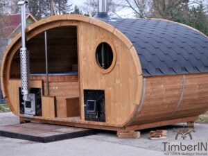 Ovale buitensauna met geintegreerd bubbelbad 33