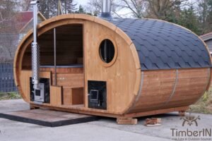 Ovale buitensauna met geintegreerd bubbelbad 35