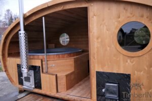 Ovale buitensauna met geintegreerd bubbelbad 37
