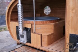 Ovale buitensauna met geintegreerd bubbelbad 39