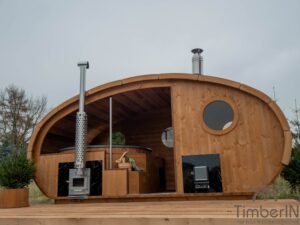 Ovale buitensauna met geintegreerd bubbelbad 66
