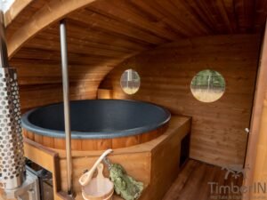 Ovale buitensauna met geintegreerd bubbelbad 72