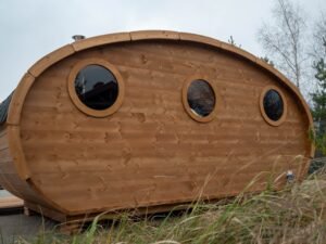 Ovale buitensauna met geintegreerd bubbelbad 74