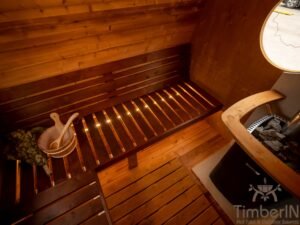 Ovale buitensauna met geintegreerd bubbelbad 77