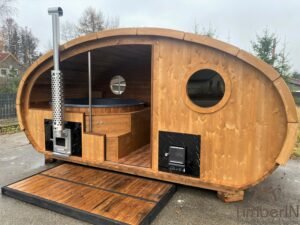 Ovale buitensauna met geintegreerd bubbelbad 8