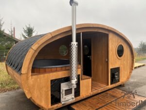 Ovale buitensauna met geintegreerd bubbelbad 9